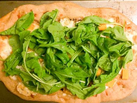 A pizza made from fresh, local ingredients