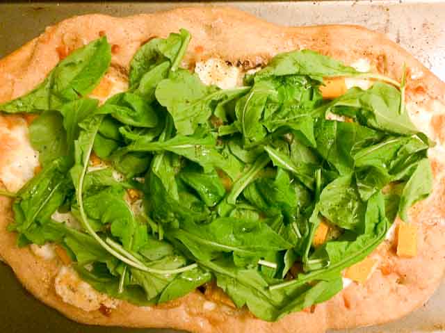 A pizza made from fresh, local ingredients