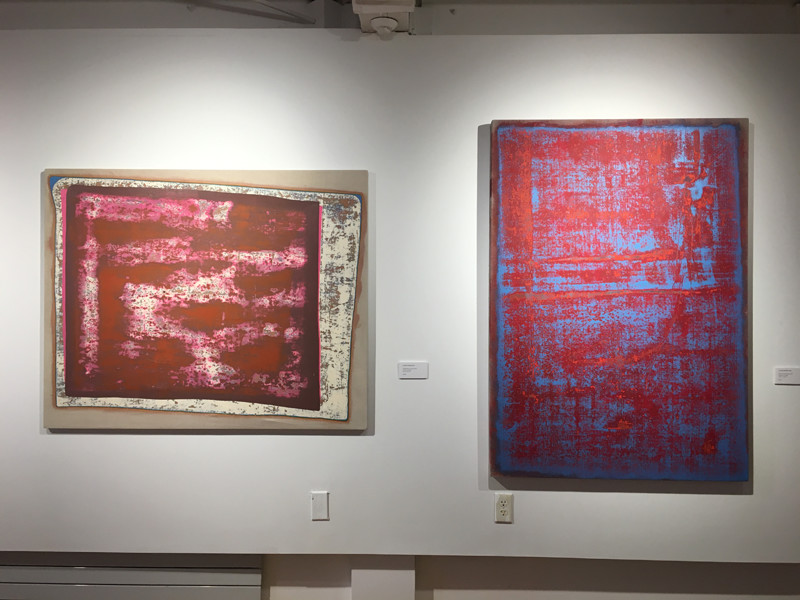 Two of Justin Hoekstras Heavy Smile pieces are displayed in the Burlington City Arts Center. The exhibit is open to the public through July 9.