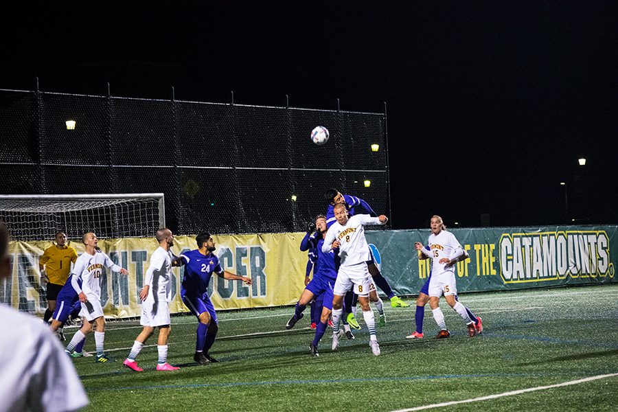 Sophomore Arnar Steinn Hansson (top) and Junior Dani Rovira (bottom) battle for the ball against the University at Albany Nov. 8. The Catamounts lost to the Great Danes 1-0. 
