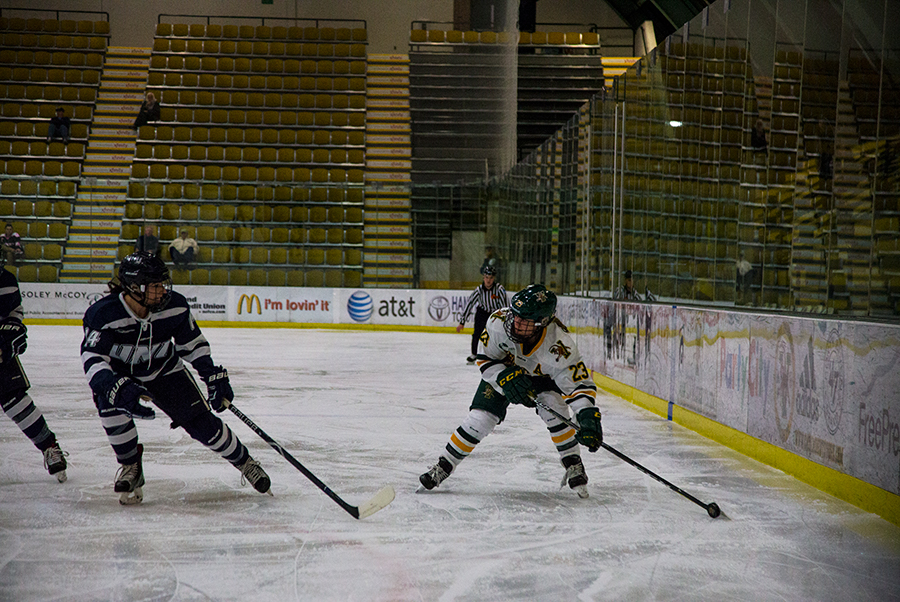 Junior forward Alyssa Gorecki looks to pass down ice against UNH Oct. 20. Gorecki was named Hockey East Player of the Week Nov. 13 after scoring two goals against defending national champions Clarkson University.