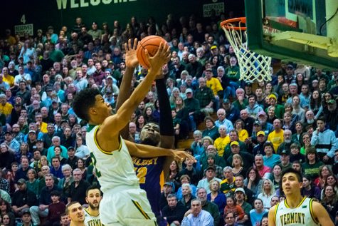 Senior Trae Bell-Haynes drives to the rim against Albany Jan. 24. The Catamounts are headed to the America East championship this weekend after beating the Seawolves Tuesday, March 6