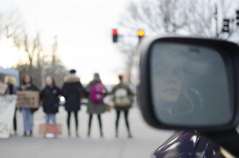 Students protest University president
