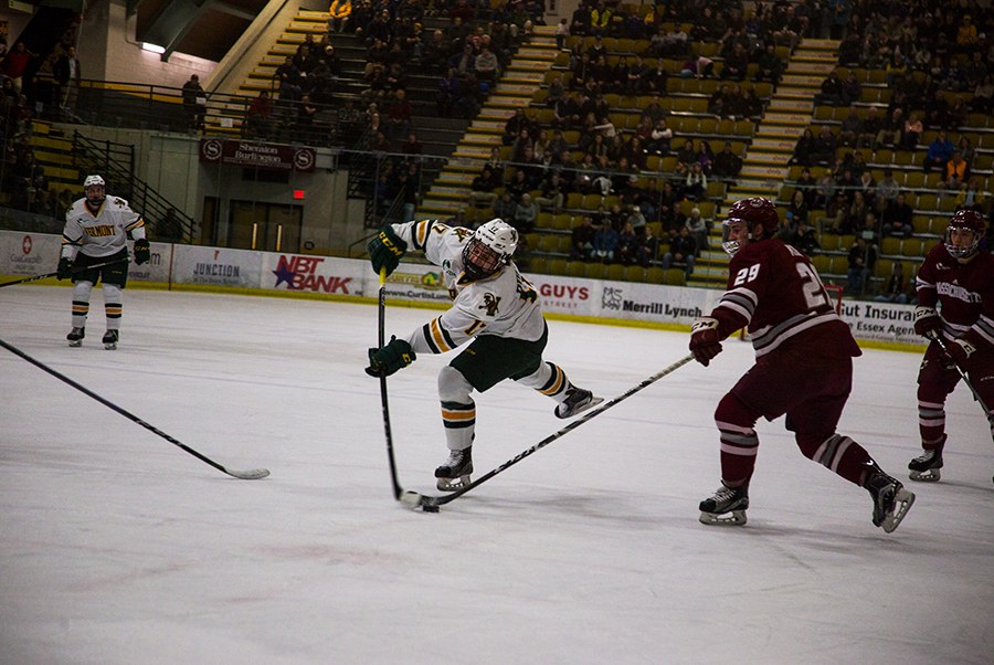 Sophomore forward Derek Lodermeier takes a shot against UMass Amherst Jan. 12. The Catamounts are 8-15-5 overall this season.