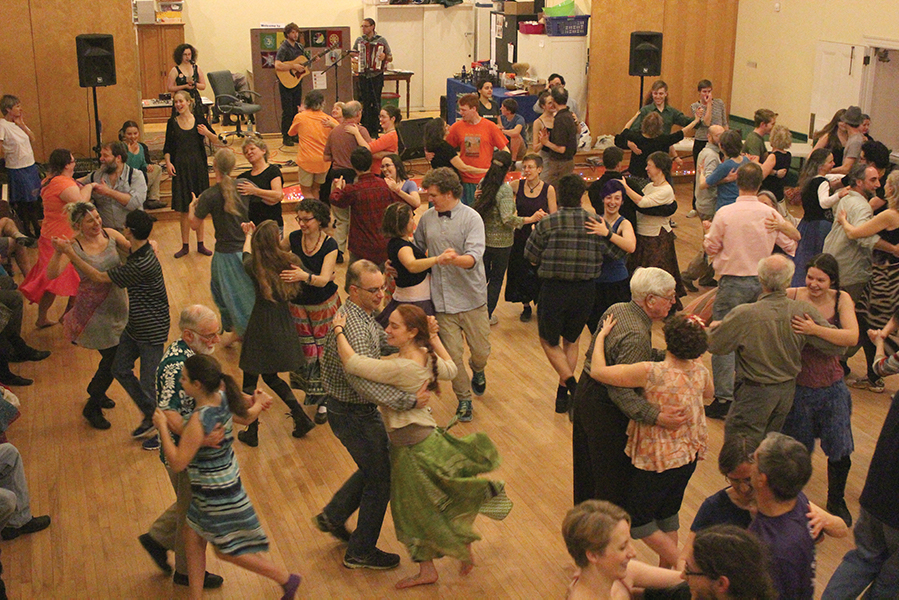 The Mad Robin Callers Collective, a group that meets to work on calling contra dances, gather at the Rose Street Co-op, a living and community space for artists in Burlington’s Old North End, to begin an afternoon of contra dancing.