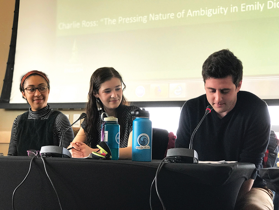 Junior Cameron Bauserman (right), senior Kelly Gray (center) and senior Charlie Ross (left) present their papers at the first English department Student Symposium March 29. The symposium gave students an opportunity to present their work and receive the recognition they deserve, English professor Sean Witters ‘98 said.