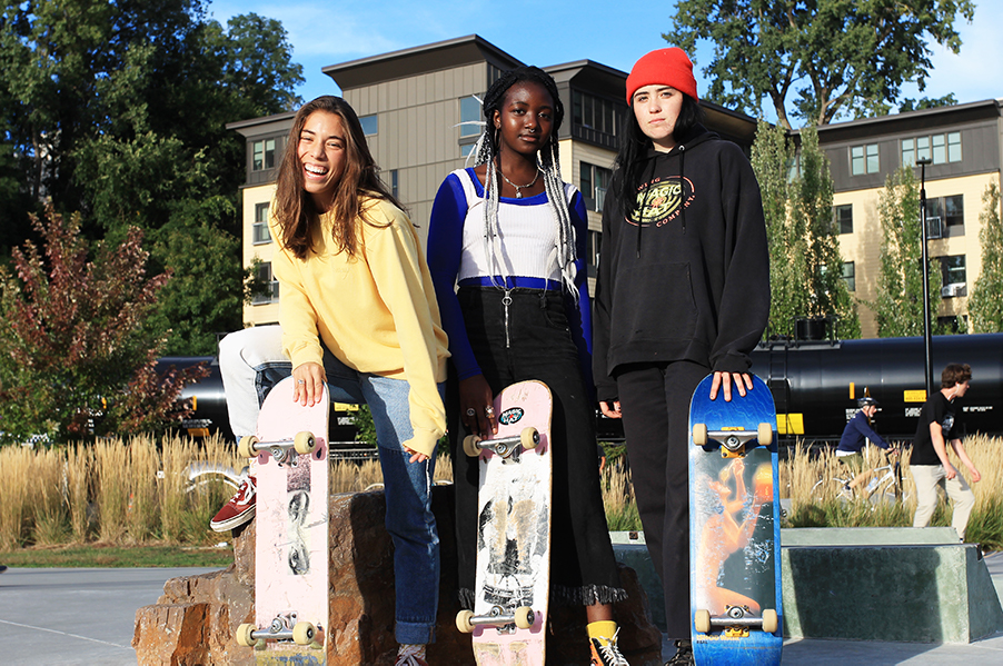 Junior Paige Van Patten, sophomore Ivana Djiya and junior Abby Trombley pose for a photo at the Andy A. Dog Skate Park on Waterfront North. “I’ve heard a lot of girls talk and say, ‘I’m too scared,’ but no one is really bothered by the fact you’re learning,” Van Patten said.