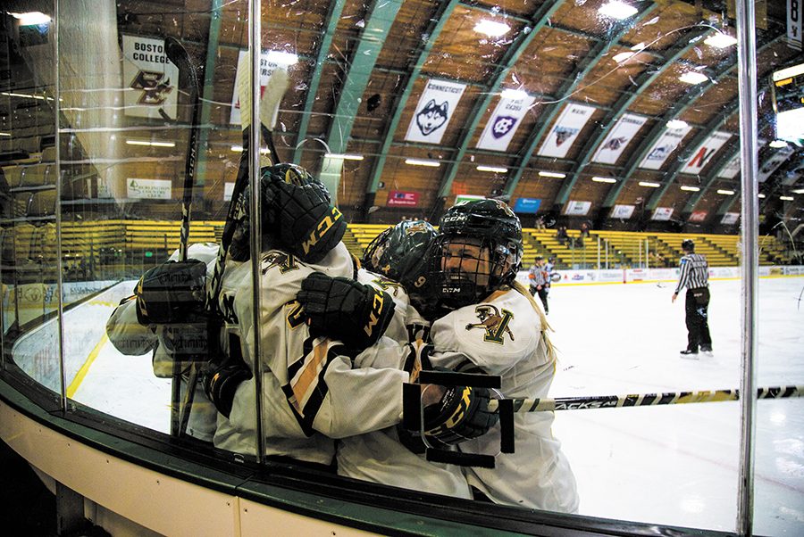 The UVM women’s hockey team celebrates a goal in the win against the University of Maine. The teams met twice this week with Maine winning the first game and UVM winning the second. 