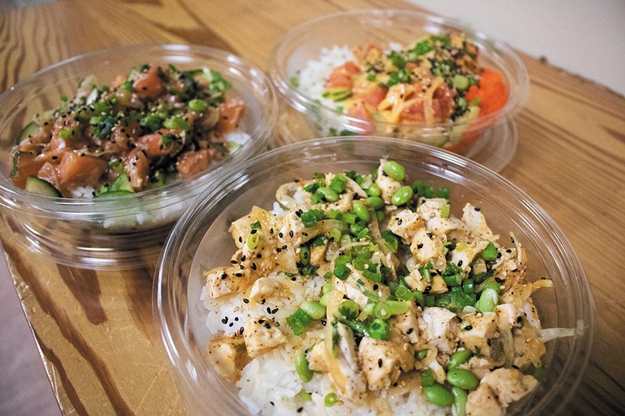 The sweet ginger chicken, shiso salmon and spicy ahi tuna poke bowls are all “Signature Works” that can be found at Pokeworks on Church Street. Depending on the ingredients you choose, bowls cost about $10 to $13.