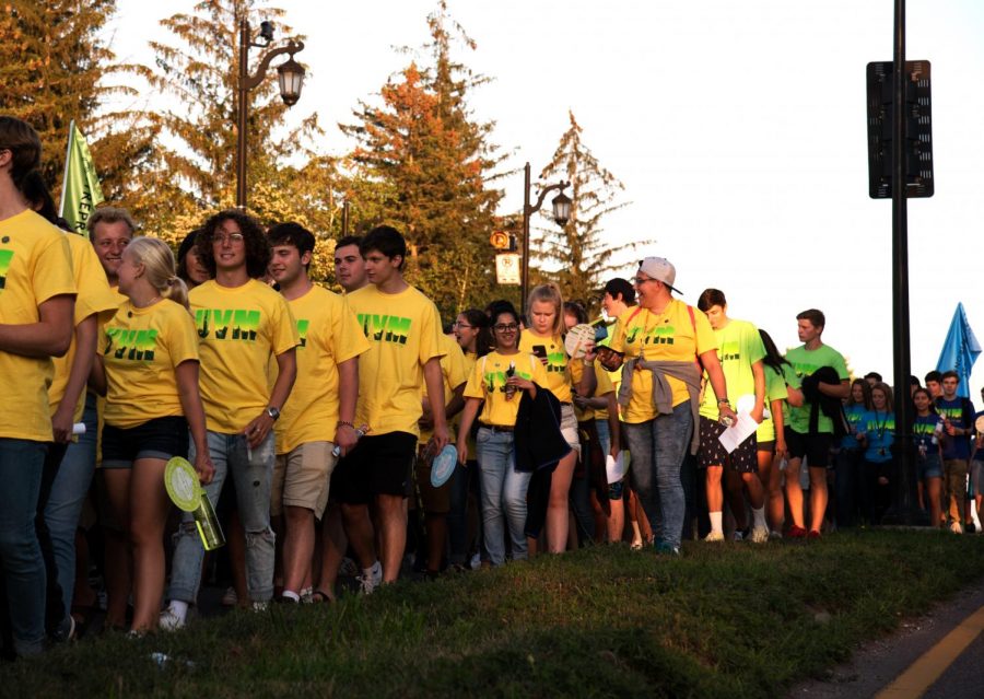 First-year students walk down Main Street as part of the annual Convocation and Twilight Induction Ceremonies. Since 1997, the number of enrolled in-state students at UVM has decreased by 13%, going as low as 20% in 2015.