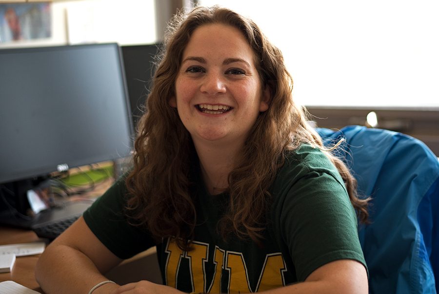 SGA President Jillian Scannell, a senior, smiles while her photo is taken, Sept. 4. After winning the election that produced the biggest voter turnout seen in years, Scannell began her presidency with the intent of making herself more available for all students. 
