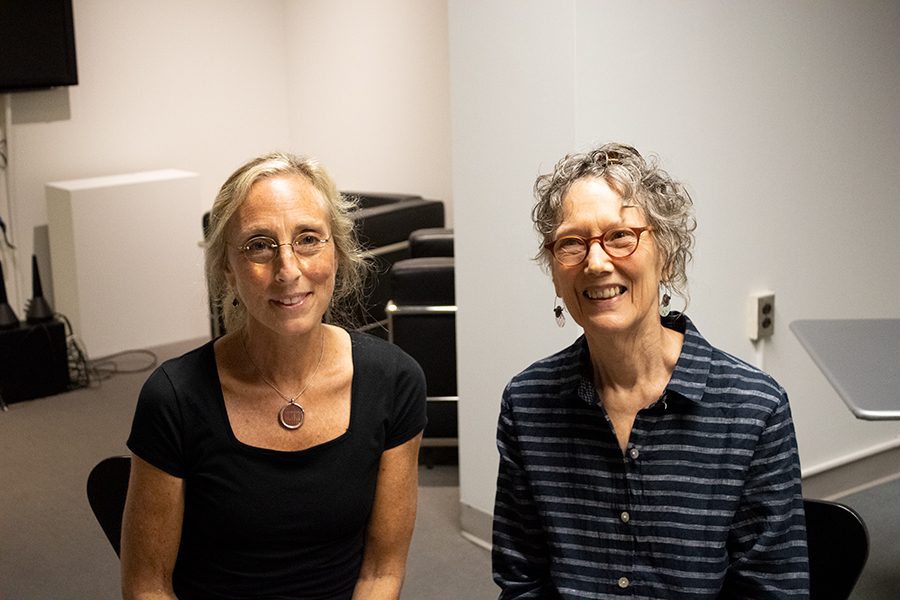 (Left to Right) Poets Sara London and Sue Burton pose for pictures after reading their work at Painted by Word at Fleming Museum, Sept.12. 