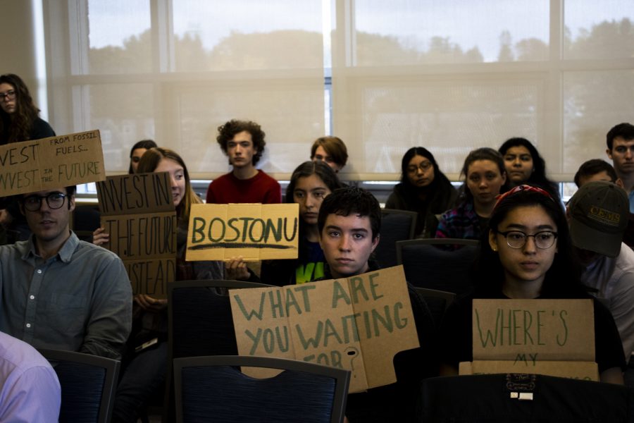 Students protest silently during a board of trustees meeting in Livak Ballroom, Oct. 26. The meeting was one of several that took place over the course of Oct. 25-26.