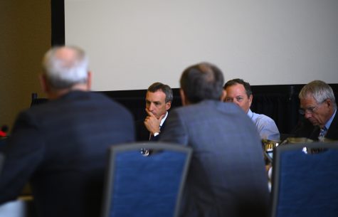 Board of trustees chair skips out on last meeting