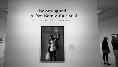 The words, “Be Strong and Do Not Betray Your Soul,” along with a photograph taken by African American artist John Edmonds is the first piece museum goers see as they enter the exhibit of the same name. The exhibit is on loan to the University until Dec. 23.