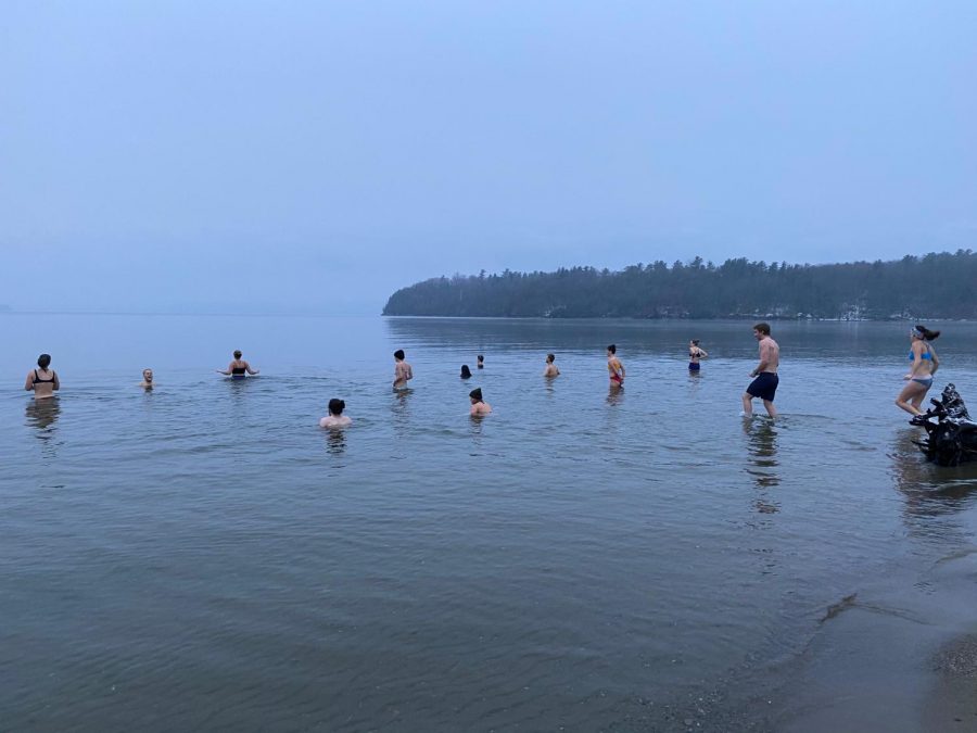Students run into Lake Champlain at 7 a.m., Nov. 20, 2019. 