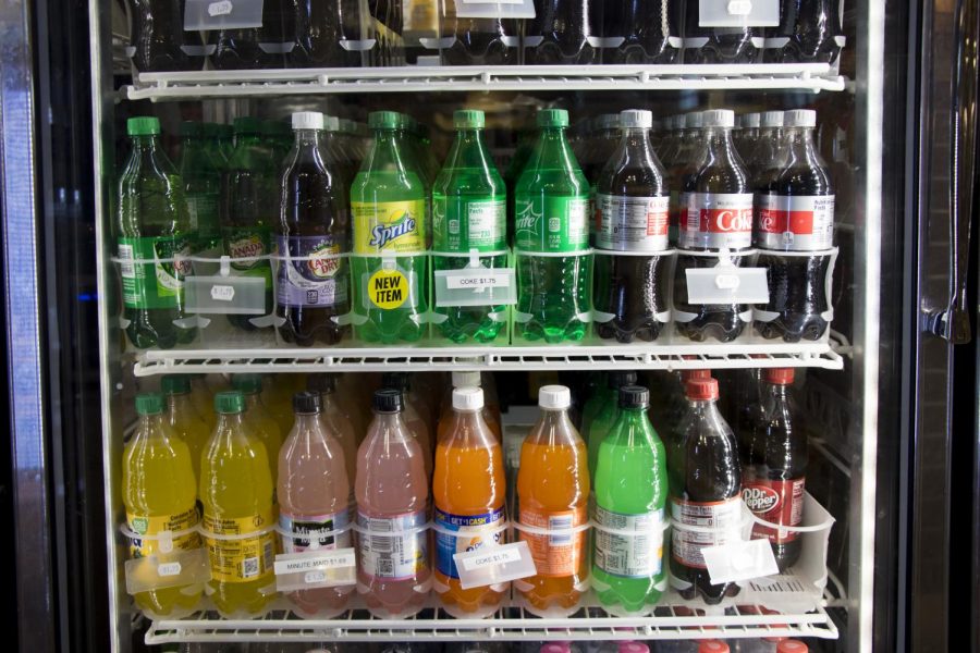 Different beverages for sale in plastic bottles sit in coolers in Redstone Marketplace, Nov. 20. A University-wide ban was enacted in 2013 to ban the sale of plastic water bottles.