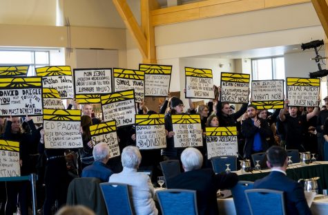 Following student action, trustee says he’s ready to divest