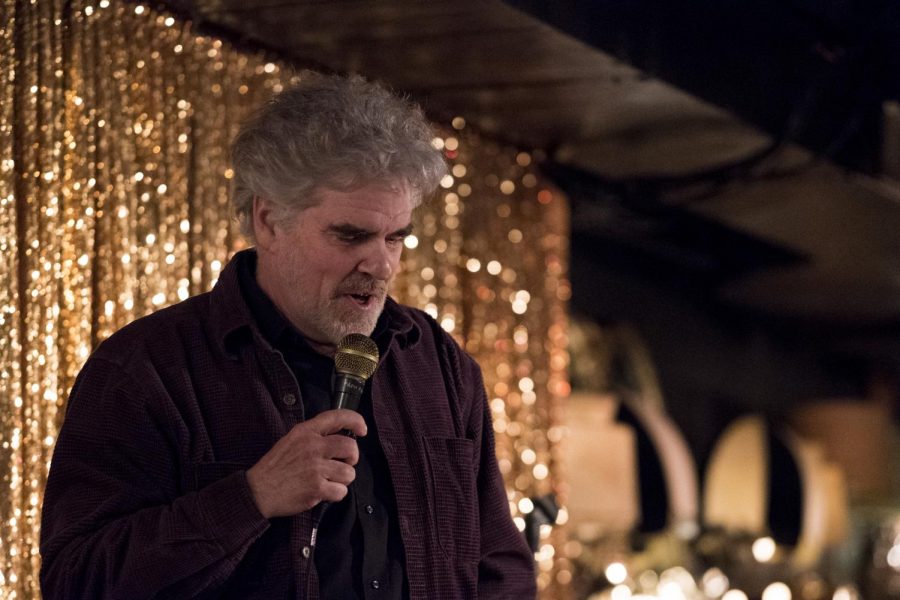 Gordon Clark tells jokes during his set at Death Talks, Jan. 28. Clark was one of a number of performers at the event, which took place at Light Club Lamp Shop.