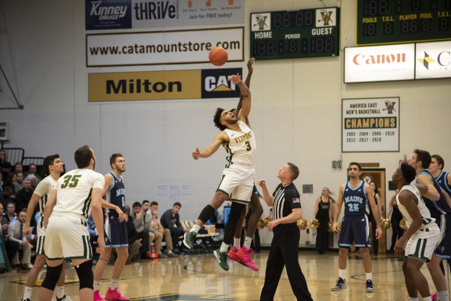 Anthony Lamb 20 reaches for the ball at a home game against University of Maine Feb. 5, 2020. Lamb, who signed with an NBA team this fall, has been accused of raping a fellow student-athlete while at UVM, according to a recently filed lawsuit against the University. 