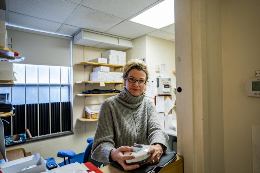 Stacey Sigmon holds a “medi wheel” device in her clinic in the Vermont Center for Behavior and Health, Feb. 3. The new UVM Center on Rural Addiction is dedicated to addressing the opioid issue within rural communities through developed research.
