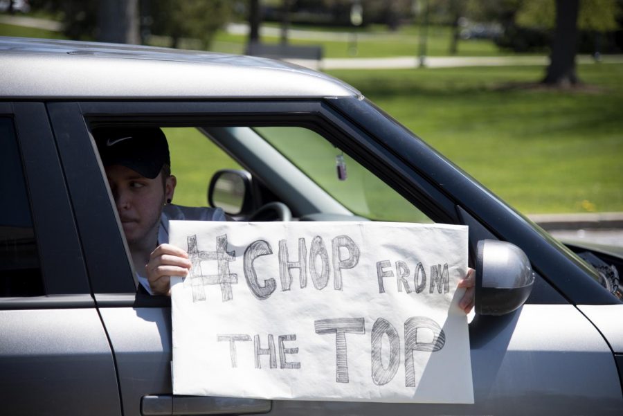 Protestors took to their cars to drive in a loop around UVMs campus May 14, 2020. Protestors are asking UVM officials to place more cuts on upper level administrators rather than the Universitys educational core. 