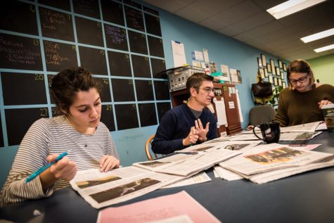 Erika Lewy and Olivia Bowman go through a weekly critique of the Cynic with faculty adviser Chris Evans 2017.