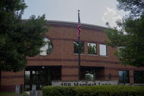 Rain pours down on Immigration and Customs Enforcement's Law Enforcement Support Center in Williston, Vermont July 8. This building is the