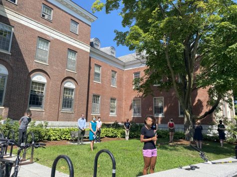 Burlington City Councilor Zoraya Hightower speaks outside Waterman Building at a protest against UVM's reopening plan Friday, Aug. 14.