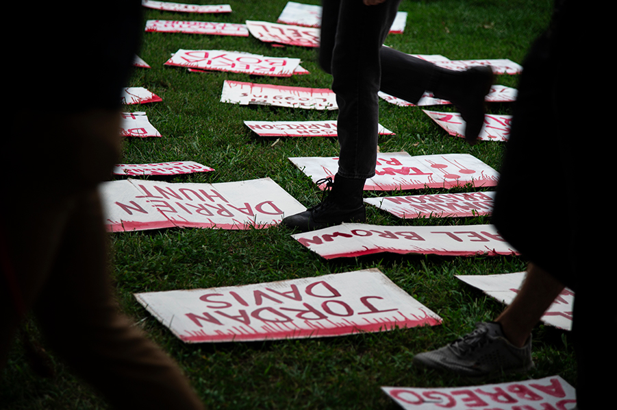 The protestors split themselves and handed signs bearing the names of three Burlington Police Officers to all white protestors while the BIPOC protestors were given signs bearing the names of victims of police brutality Sep. 1.