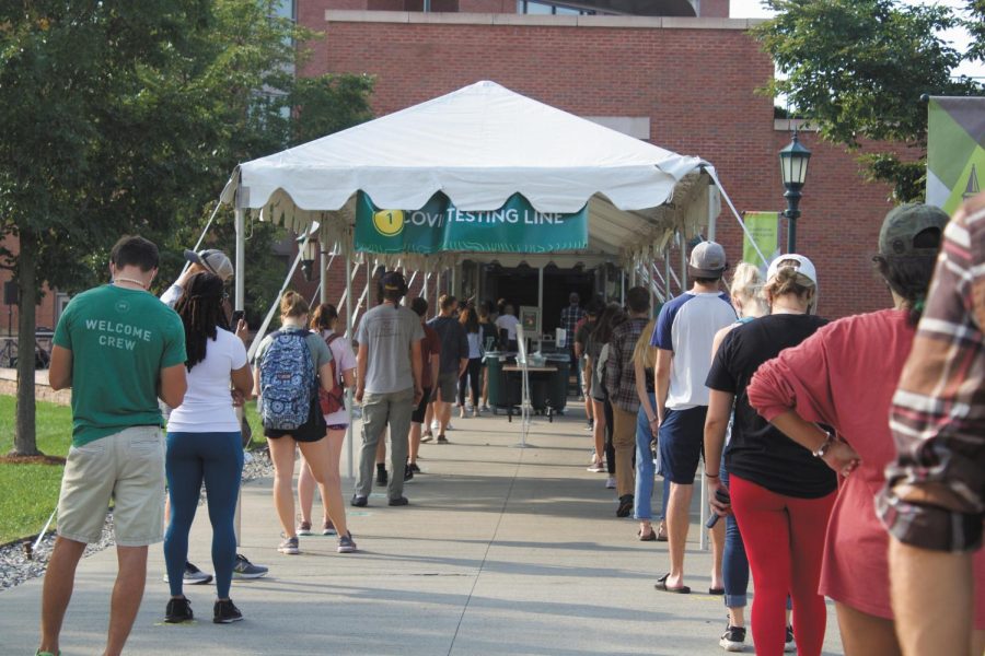 UVM+students+stand+in+a+long+line+outside+of+the+Davis+center+Covid+testing+site%2C+Sept.+10.