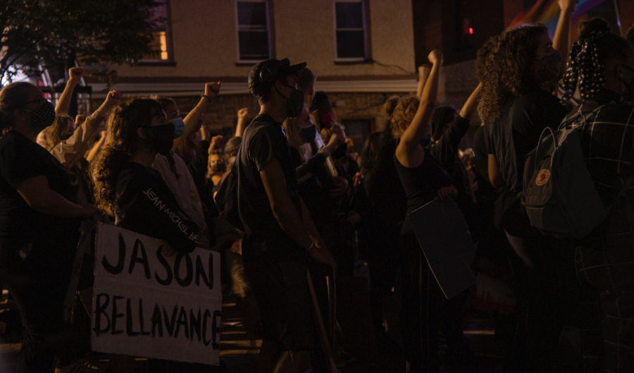 Hundreds of protesters raised their right fist as organizers spoke outside Burlington City Hall Wednesday night in a call for racial justice and an end to police violence.
