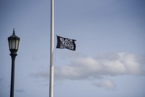 UVM Student-Athletes of Color Affinity Group raised the Black Lives Matter flag without permission outside Patrick Gym Sept. 12, rejecting the University's excuses for removing the flag from the Davis Center.