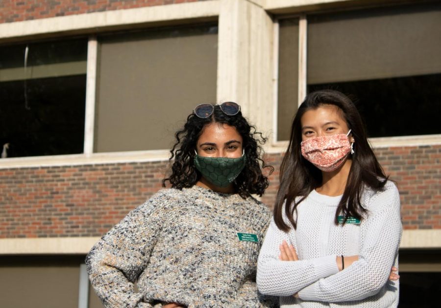 Juniors Tasha Kalra and Sophie Tom stand in front of Rowell Hall, Oct. 9. Kalra and Tom are both a part of the nursing program at UVM.