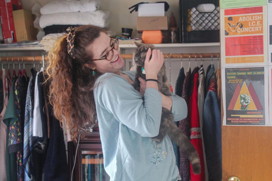  UVM Senior Anna Shea holds her cat Pesto in her off-campus apartment Jan. 30.