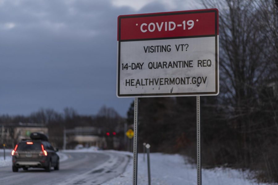 The+state+installed+COVID-19+sign+stands+off+of+exit+14E+to+let+out-of-state+travelers+know+the+Vermont+guidelines+for+COVID+Jan.+25.+A+14+day+quarantine+is+required+of+all+out-of-state+travelers+among+other+safety+precautions.+