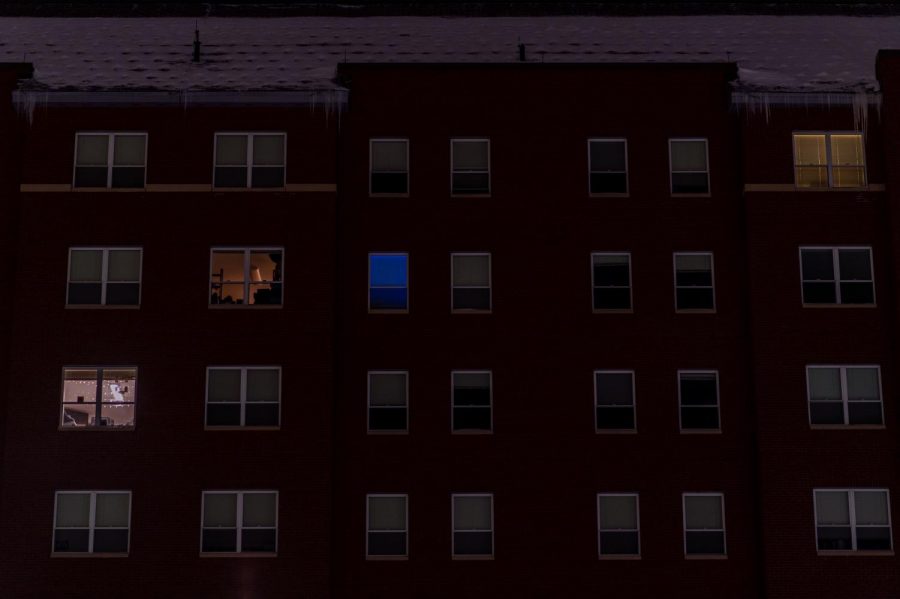 Four rooms inside of Central Campus Residence Hall are lit up Jan. 21. 