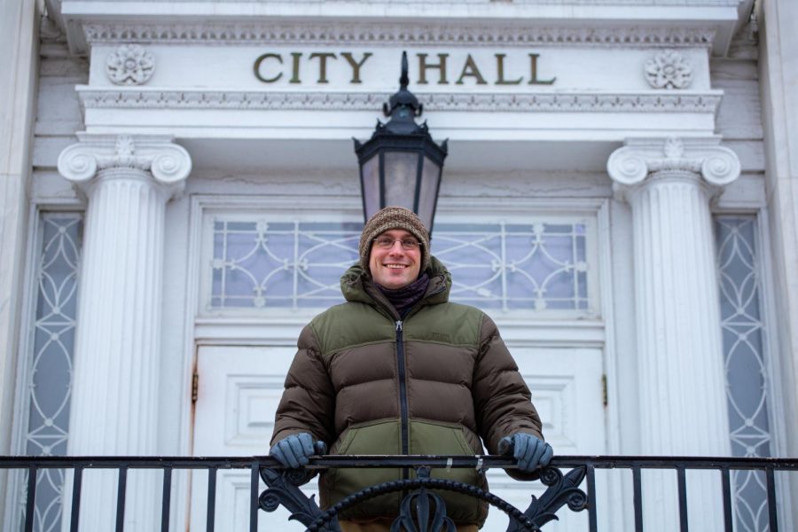 Max Tracy 2021 Burlington Mayoral Candidate stands at the top of the City Hall steps Feb. 18.