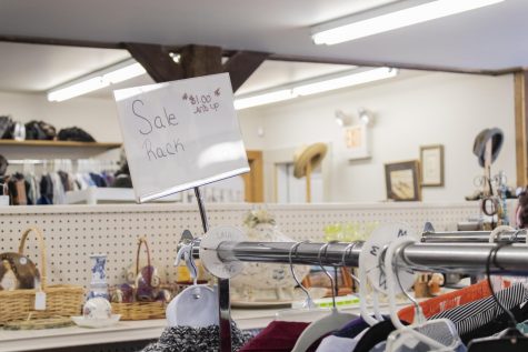 A sign inside of Shalom Shuk, a thrift store located in a historic barn behind the Ohavi Zedek Synagogue on 188 North Prospect Street, shows shoppers there is a sale Feb. 4. Founded in 1855 the Ohavi Zedek Synagogue is Vt.’s oldest and largest Jewish congregation.