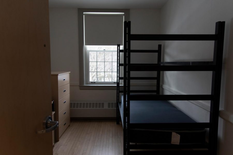 An empty Slade Hall bedroom on the second floor of the dormitory has a window that looks out to South Prospect Street Feb. 11.