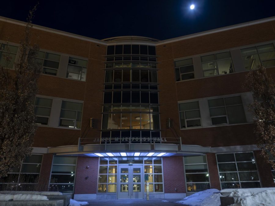 The moon shines above Jeffords Hall on a clear night Feb. 26.