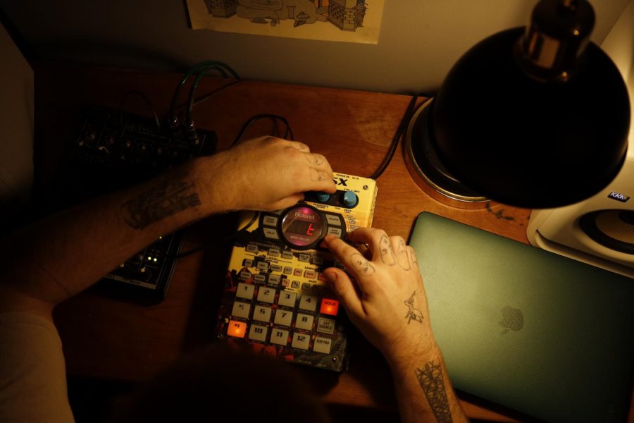 Chaz Krouse ‘21 aka DJ Greyhound sits in his home studio Sept. 9.