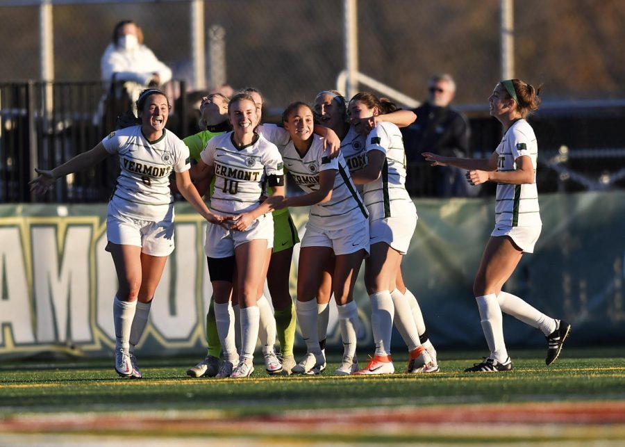 Members of the women's soccer team celebrate during the America East Championship game Nov. 7.