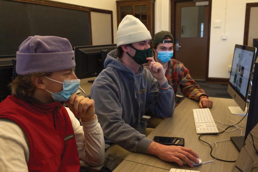 Junior Casey Pope, senior Nick Corsini and first-year Emmett MacGregor (left to right) review their work in Cohen Hall’s digital lab Feb. 25.

