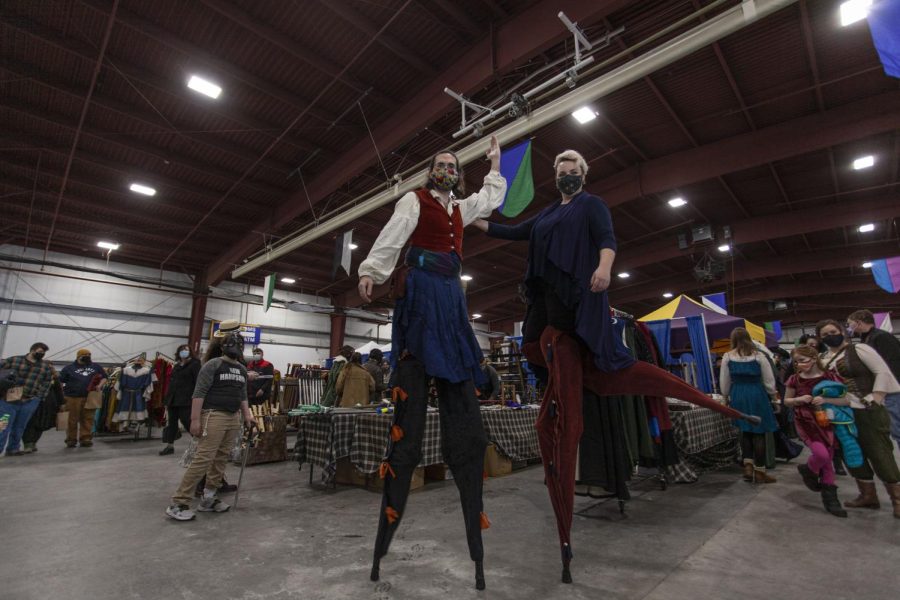 Two attendees of the Renaissance Faire pose on stilts Feb. 5. The Champlain Valley Expo Center in Essex Junction hosts the event every year.