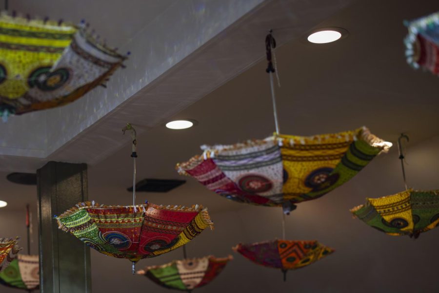Umbrellas hang from the ceiling of the restaurant March 18.