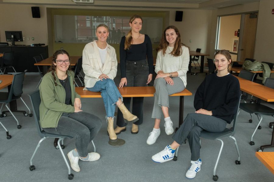 Equity Chair Emma Fox, a senior, Marketing Executive Lauren Drasher, a senior,  President Emily Howard, a senior, Vice President Marielle Clerc, a senior, and Secretary of Communication Marguerite Jouët, a sophomore (Left to right) in Kalkin Hall March 25.
