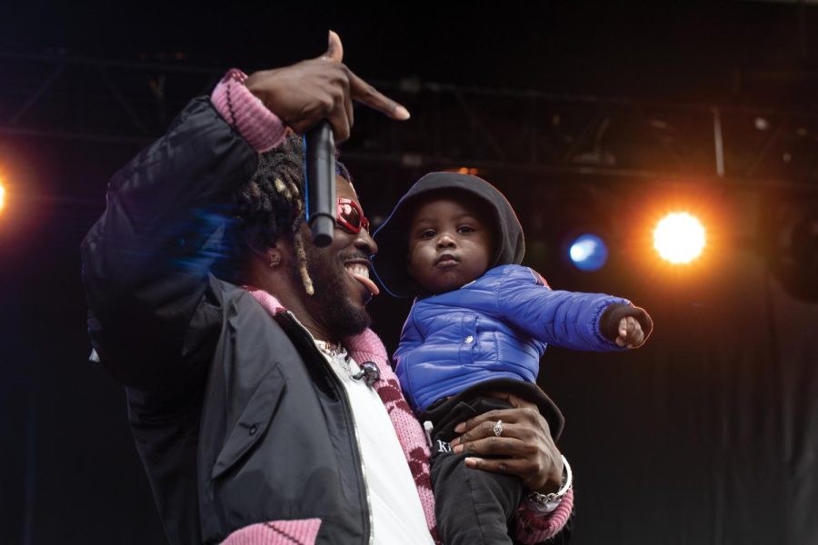 SAINt JHN welcomes his public relations manager’s baby on stage.