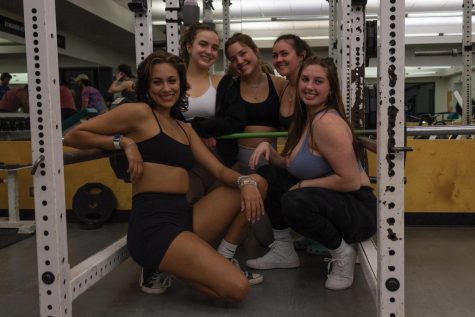 Director of Marketing Liv Roscoe, a freshman, co-event coordinator Shayna Minsk, a freshman, co-vice president Ally Wheeler, a sophomore, secretary Abby Shea, a freshman, and president Sarah Gremelsbacker, a sophomore (left to right), in the Patrick Gym March 30.