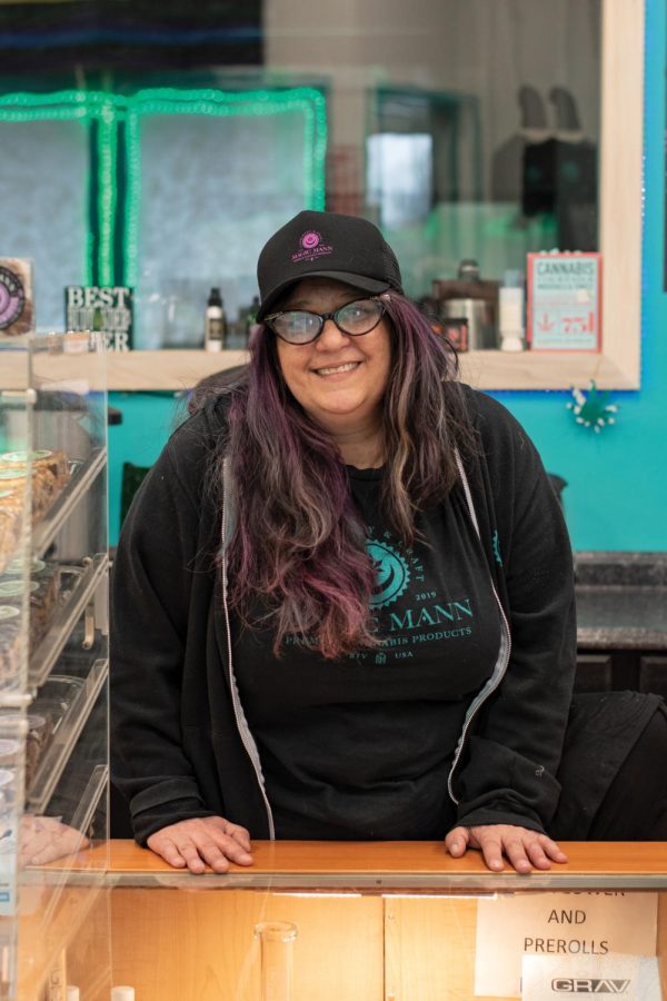Founder Meredith Mann behind the counter of Magic Mann Cannabis Bakery and Cafe April 16.
